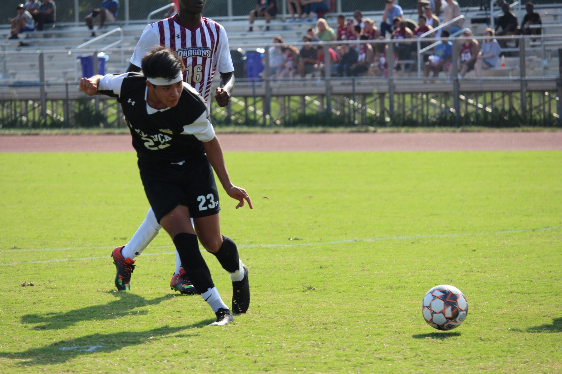 Cougars remain perfect with road win over Cardinals